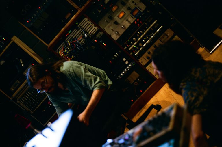 A man at a mixing board