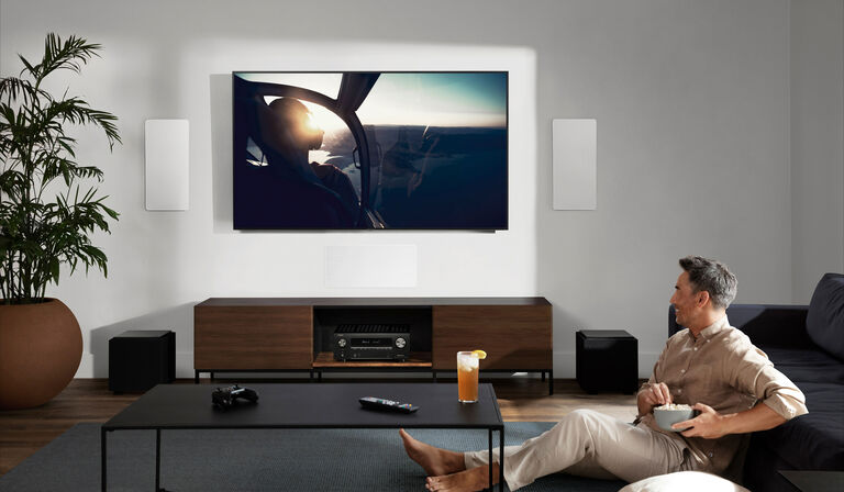 A man watching TV
