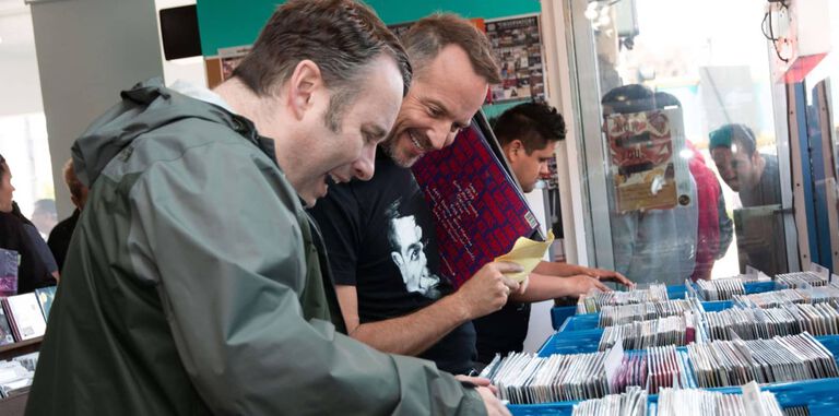People looking through records