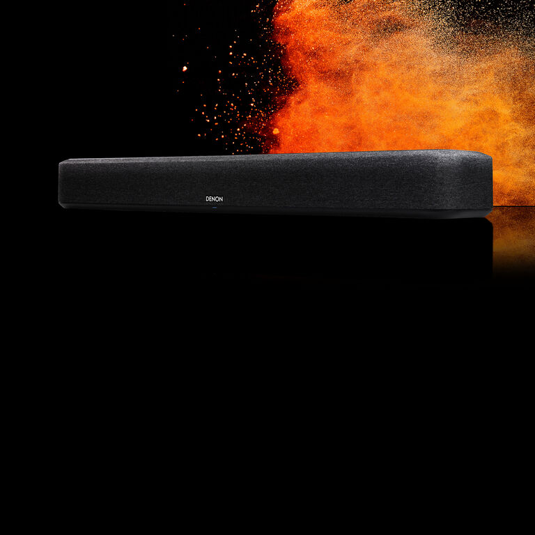 A soundbar with a fiery background