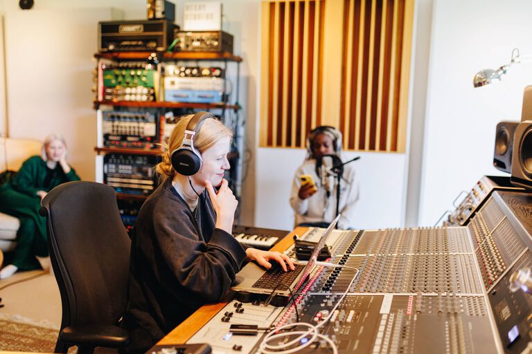 Women at a sound board