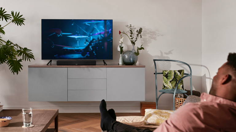A man watching TV