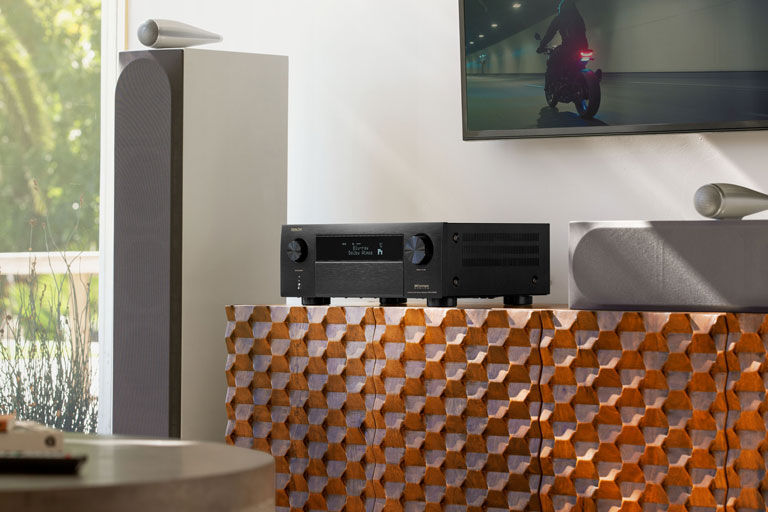 An AVR with speakers nearby