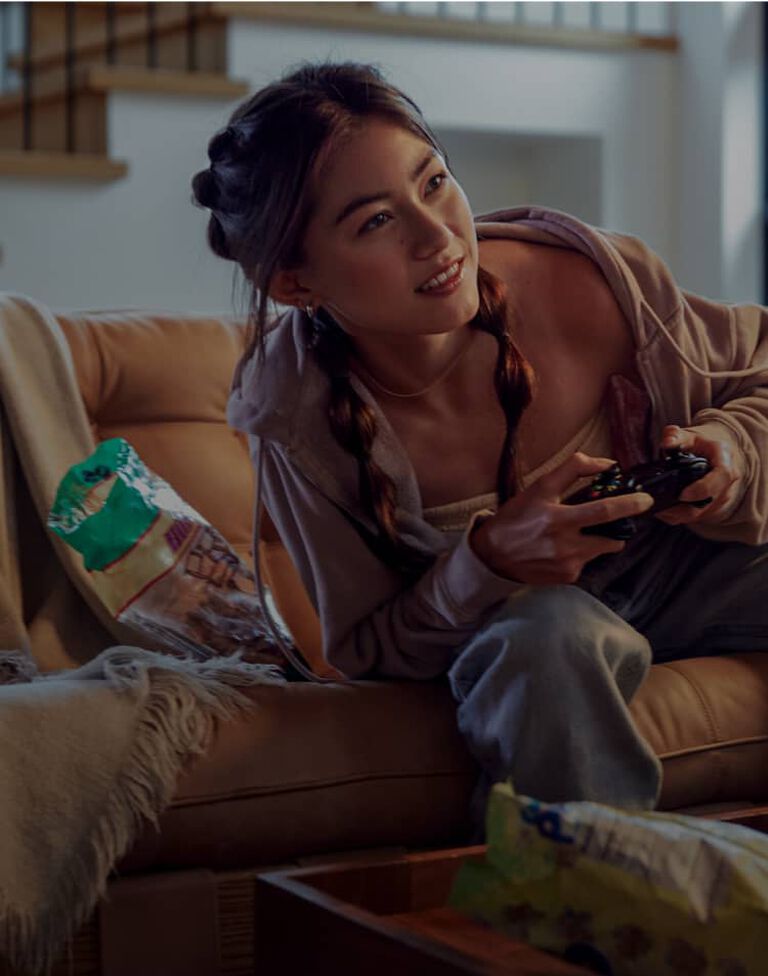 young woman playing video games