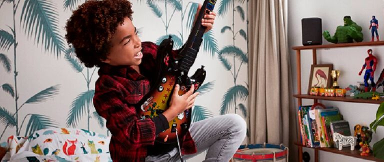 A boy playing a guitar