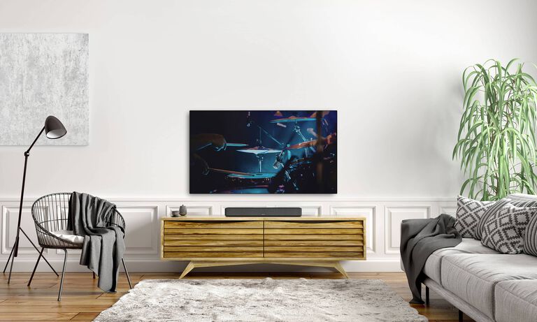 A soundbar under a TV