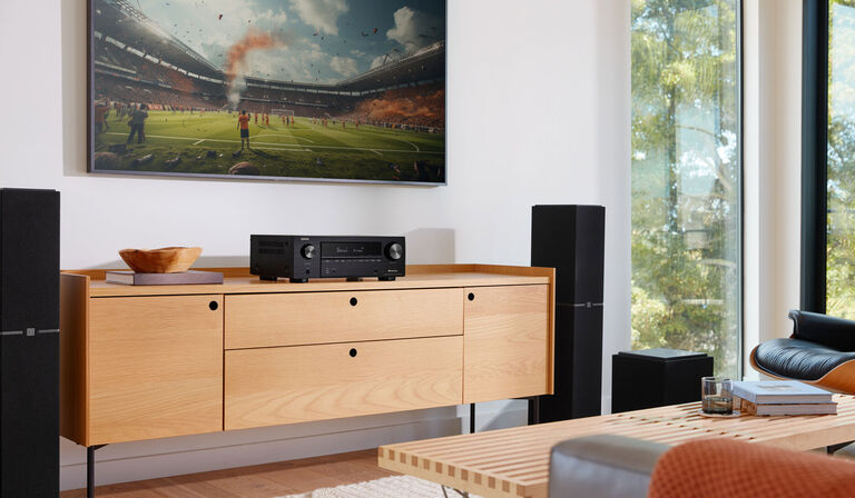 An AVR under a TV