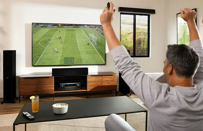 A man watching TV