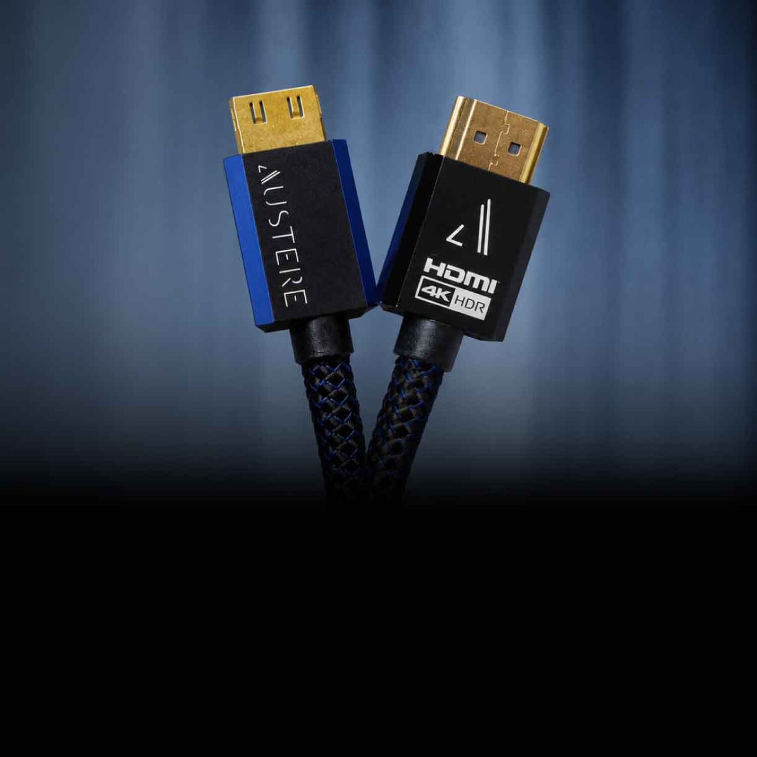 Austere Cables twisting together on a blue background
