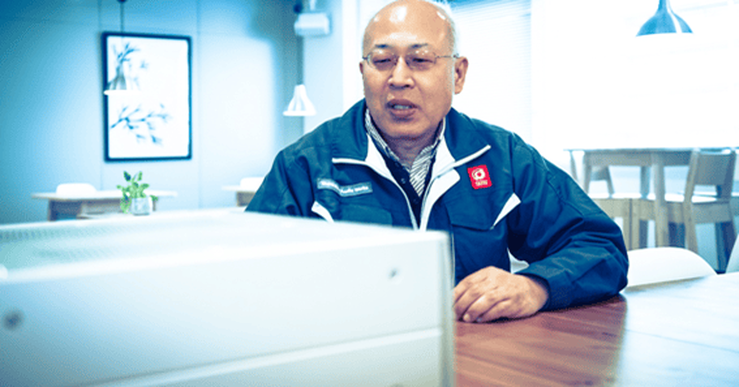 A man talking in front of an avr